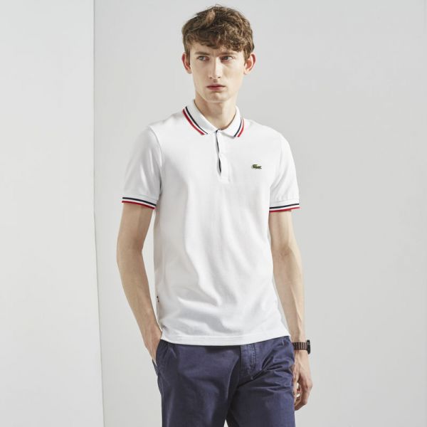 POLO LACOSTE LIVE SLIM FIT EM PETIT PIQUÉ COM ACABAMENTO EM VIVO TRICOLOR