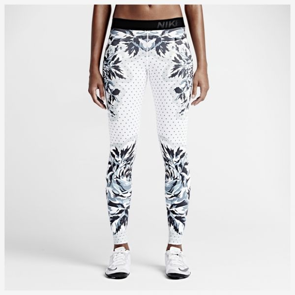 CALÇA NIKE TIGHT OF THE MOMENT FEMININA